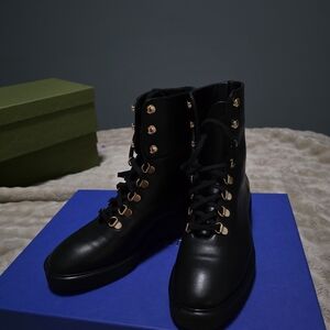 Stuart Weitzman Black Lace-Up Boots with Gold Hardware
